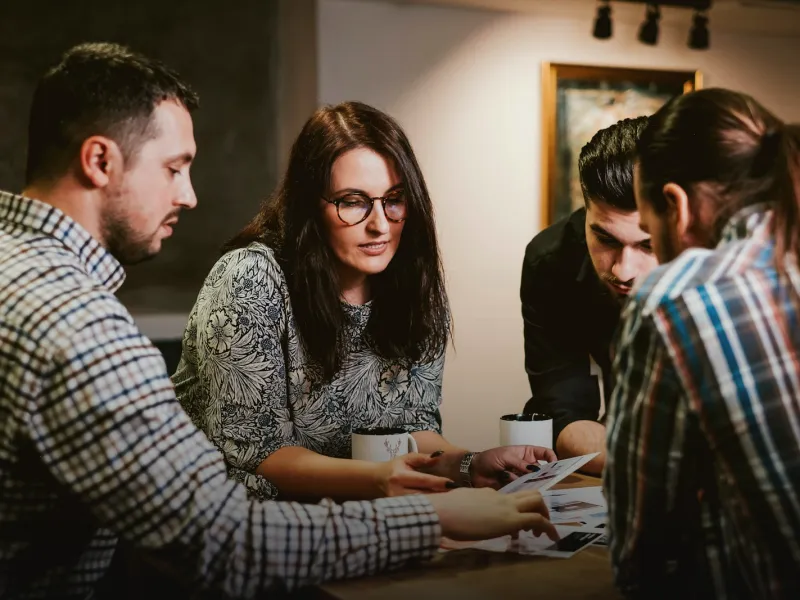 An agency team reviewing a client project together